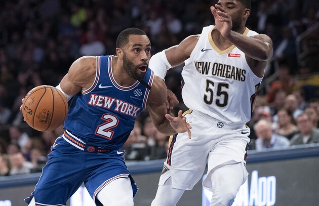 New York Knicks guard Wayne Ellington (2) drives against New Orleans Pelicans guard E'Twaun Moore during the second half of an NBA basketball game, Friday, Jan. 10, 2020, at Madison Square Garden in New York. (AP Photo/Mary Altaffer)