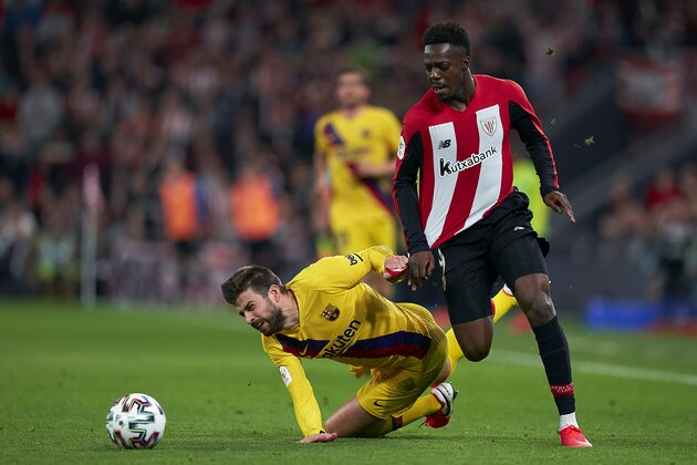 BILBAO, SPAIN - FEBRUARY 06: Inaki Williams of Athletic Bilbao competes for the ball with Gerard Pique of FC Barcelona during the Copa del Rey Quarter Final match between Athletic Bilbao and FC Barcelona at Estadio de San Mames on February 06, 2020 in Bilbao, Spain. (Photo by Quality Sport Images/Getty Images) BILBAO, SPAIN - FEBRUARY 06: Inaki Williams of Athletic Bilbao competes for the ball with Gerard Pique of FC Barcelona during the Copa del Rey Quarter Final match between Athletic Bilbao and FC Barcelona at Estadio de San Mames on February 06, 2020 in Bilbao, Spain. (Photo by Quality Sport Images/Getty Images)