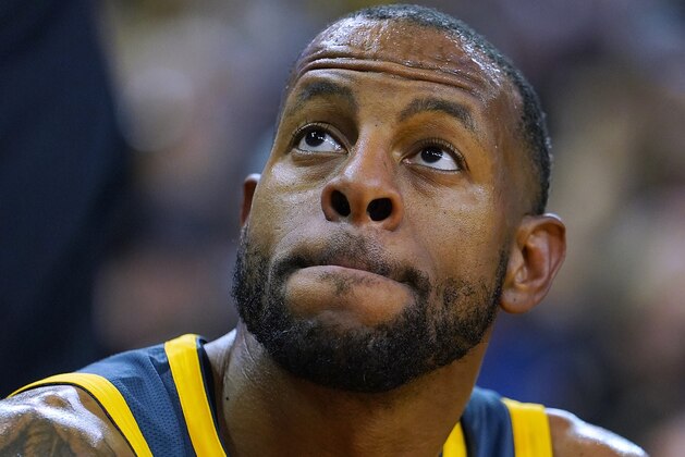 OAKLAND, CA - NOVEMBER 21:  Andre Iguodala #9 of the Golden State Warriors looks on from the bench against the Oklahoma City Thunder during an NBA basketball game at ORACLE Arena on November 21, 2018 in Oakland, California. NOTE TO USER: User expressly acknowledges and agrees that, by downloading and or using this photograph, User is consenting to the terms and conditions of the Getty Images License Agreement.  (Photo by Thearon W. Henderson/Getty Images)