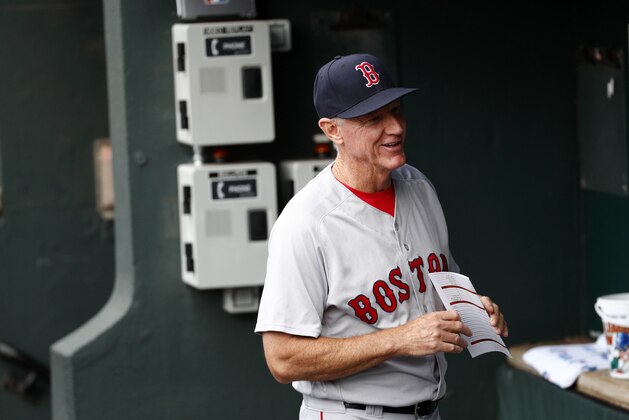 Boston Red Sox bench coach Ron Roenicke stands in the dugout before a baseball game against the Baltimore Orioles, Monday, July 23, 2018, in Baltimore. (AP Photo/Patrick Semansky)