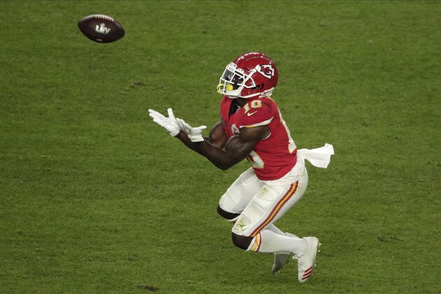 Kansas City Chiefs' Tyreek Hill (10) catches a pass, during the second half of the NFL Super Bowl 54 football game against the San Francisco 49ers, Sunday, Feb. 2, 2020, in Miami Gardens, Fla. (AP Photo/Charlie Riedel)