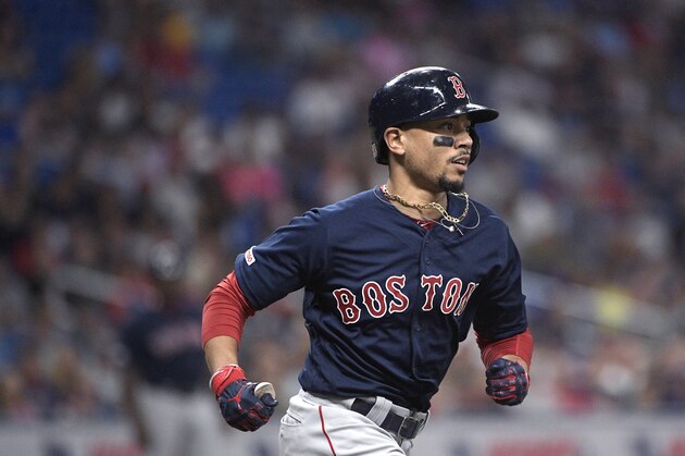 Boston Red Sox's Mookie Betts runs to first base on a ground out during the third inning of a baseball game against the Tampa Bay Rays Friday, Sept. 20, 2019, in St. Petersburg, Fla. (AP Photo/Phelan M. Ebenhack) Boston Red Sox's Mookie Betts runs to first base on a ground out during the third inning of a baseball game against the Tampa Bay Rays Friday, Sept. 20, 2019, in St. Petersburg, Fla. (AP Photo/Phelan M. Ebenhack)