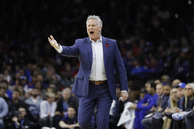 Philadelphia 76ers' Brett Brown coaches during an NBA basketball game against the Golden State Warriors, Tuesday, Jan. 28, 2020, in Philadelphia. (AP Photo/Matt Slocum)