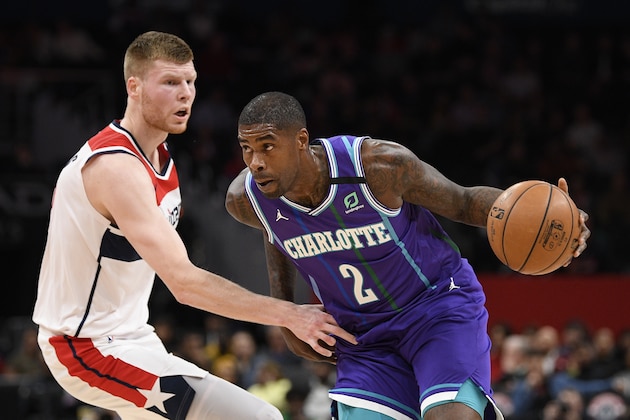 Charlotte Hornets forward Marvin Williams (2) dribbles the ball against Washington Wizards forward Davis Bertans (42) during the first half of an NBA basketball game, Thursday, Jan. 30, 2020, in Washington. (AP Photo/Nick Wass) Charlotte Hornets forward Marvin Williams (2) dribbles the ball against Washington Wizards forward Davis Bertans (42) during the first half of an NBA basketball game, Thursday, Jan. 30, 2020, in Washington. (AP Photo/Nick Wass)