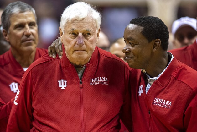 Former Indiana basketball head coach Bobby Knight, left, makes his first appearance at Indiana University since his dismissal in September of 2000. Knight, along with former player Isiah Thomas, right, are on the court during a ceremony with the Indiana players of the 1980 Big Ten championship team the halftime of an NCAA college basketball game, Saturday, Feb. 8, 2020, in Bloomington, Ind. (AP Photo/Doug McSchooler)