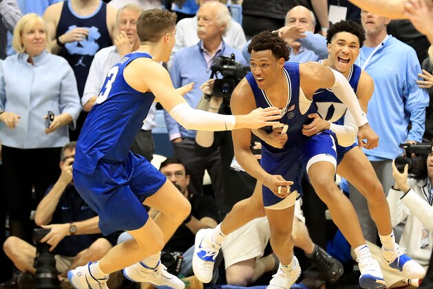 CHAPEL HILL, NORTH CAROLINA - FEBRUARY 08: Wendell Moore Jr. #0 of the Duke Blue Devils reacts after making the game winning shot to defeat the North Carolina Tar Heels 98-96 with teammates Joey Baker #13 and Jordan Goldwire #14 during their game at Dean Smith Center on February 08, 2020 in Chapel Hill, North Carolina. (Photo by Streeter Lecka/Getty Images)