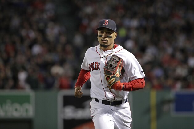 Boston Red Sox's Mookie Betts runs in from the outfield during a baseball game against the Minnesota Twins at Fenway Park, Thursday, Sept. 5, 2019, in Boston. (AP Photo/Elise Amendola)