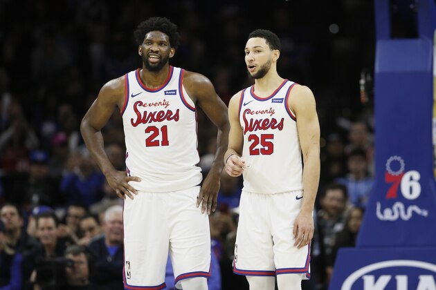 Philadelphia 76ers' Ben Simmons, right, and Joel Embiid talk during an NBA basketball game against the New Orleans Pelicans, Friday, Dec. 13, 2019, in Philadelphia. (AP Photo/Matt Slocum) Philadelphia 76ers' Ben Simmons, right, and Joel Embiid talk during an NBA basketball game against the New Orleans Pelicans, Friday, Dec. 13, 2019, in Philadelphia. (AP Photo/Matt Slocum)