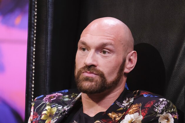 Boxer Tyson Fury speaks during a press conference with Deontay Wilder in Los Angeles, California on January 25, 2020 ahead of their re-match fight in Las Vegas on February 22. (Photo by RINGO CHIU / AFP) (Photo by RINGO CHIU/AFP via Getty Images) Boxer Tyson Fury speaks during a press conference with Deontay Wilder in Los Angeles, California on January 25, 2020 ahead of their re-match fight in Las Vegas on February 22. (Photo by RINGO CHIU / AFP) (Photo by RINGO CHIU/AFP via Getty Images)
