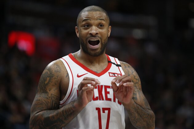 Houston Rockets forward P.J. Tucker (17) speaks with his bench in the second half during an NBA basketball game against the Utah Jazz Monday, Jan. 27, 2020, in Salt Lake City. (AP Photo/Rick Bowmer)