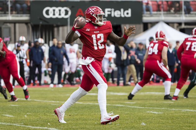 WASHINGTON, DC - FEBRUARY 08: Cardale Jones #12 of the DC Defenders looks to pass against the Seattle Dragons during the first half of the XFL game at Audi Field on February 8, 2020 in Washington, DC. (Photo by Scott Taetsch/Getty Images)