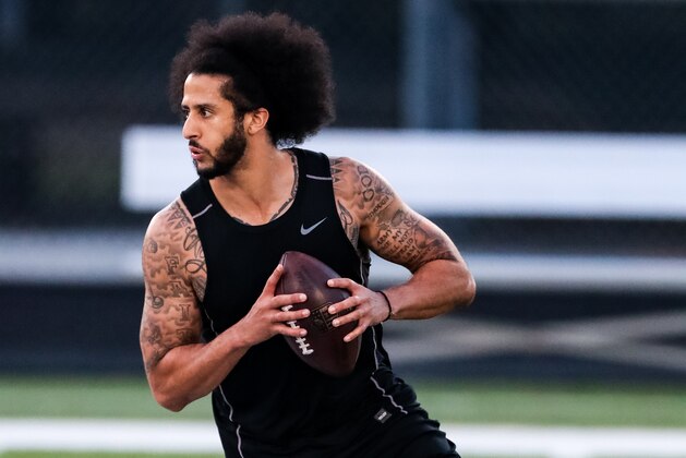 RIVERDALE, GA - NOVEMBER 16: Colin Kaepernick looks to pass during his NFL workout held at Charles R Drew high school on November 16, 2019 in Riverdale, Georgia. (Photo by Carmen Mandato/Getty Images)