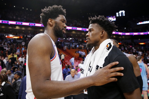 MIAMI, FLORIDA - FEBRUARY 03:  Joel Embiid #21 of the Philadelphia 76ers greets Jimmy Butler #22 of the Miami Heat after the game at American Airlines Arena on February 03, 2020 in Miami, Florida. NOTE TO USER: User expressly acknowledges and agrees that, by downloading and/or using this photograph, user is consenting to the terms and conditions of the Getty Images License Agreement.  (Photo by Michael Reaves/Getty Images)