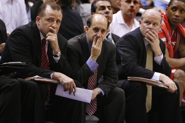 Houston Rockets coach Jeff Van Gundy, center, and assistant coaches Tom Thibodeau, left, and Steve Clifford wait for the NBA basketball playoff game against the Utah Jazz to end, during the fourth quarter Saturday, April 28, 2007, in Salt Lake City. The Jazz beat the Rockets 98-85 to even the series at two games all. (AP Photo/Steve C. Wilson)