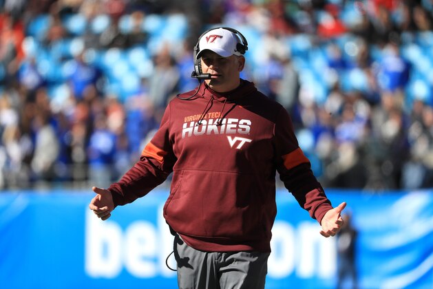 CHARLOTTE, NORTH CAROLINA - DECEMBER 31: Head coach Justin Fuente of the Virginia Tech Hokies watches on against the Kentucky Wildcats during the Belk Bowl at Bank of America Stadium on December 31, 2019 in Charlotte, North Carolina. (Photo by Streeter Lecka/Getty Images)