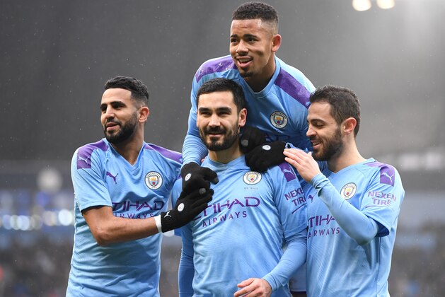 MANCHESTER, ENGLAND - JANUARY 26: Ilkay Gundogan of Manchester City celebrates after scoring his team's first goal with Gabriel Jesus, Riyad Mahrez and Bernardo Silva  during the FA Cup Fourth Round match between Manchester City and Fulham at Etihad Stadium on January 26, 2020 in Manchester, England. (Photo by Laurence Griffiths/Getty Images)