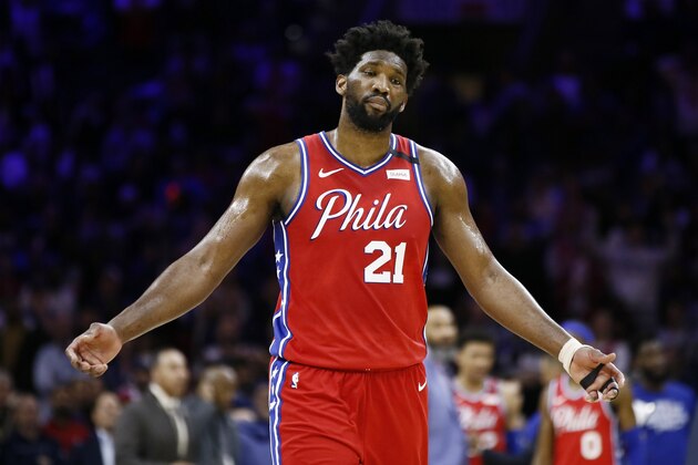 Philadelphia 76ers' Joel Embiid reacts after getting called for a double-technical foul with Los Angeles Clippers' Marcus Morris Sr. during the second half of an NBA basketball game, Tuesday, Feb. 11, 2020, in Philadelphia. (AP Photo/Matt Slocum)