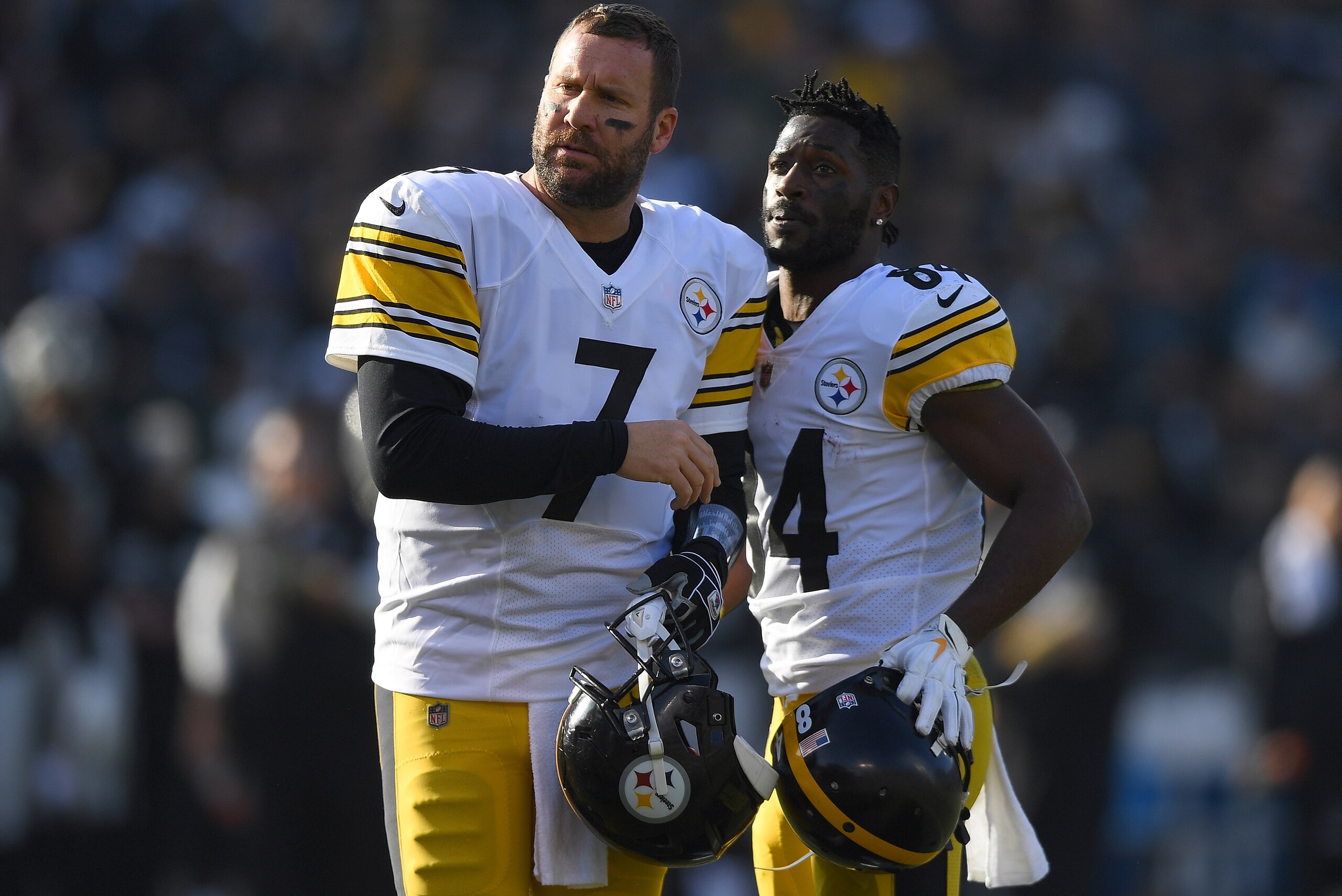 OAKLAND, CA - DECEMBER 09:  Antonio Brown #84 and Ben Roethlisberger #7 of the Pittsburgh Steelers looks on against the Oakland Raiders during the first half of their NFL football game at Oakland-Alameda County Coliseum on December 9, 2018 in Oakland, California.  (Photo by Thearon W. Henderson/Getty Images)