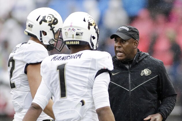 Colorado head coach Mel Tucker, right, speaks with quarterback Steven Montez, left, and running back Jaren Mangham as they come off the field during the first half of an NCAA college football game against Washington State in Pullman, Wash., Saturday, Oct. 19, 2019. (AP Photo/Young Kwak)