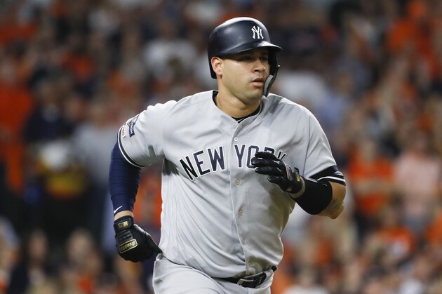 New York Yankees' Gary Sanchez runs to first during the second inning in Game 2 of baseball's American League Championship Series against the Houston Astros Sunday, Oct. 13, 2019, in Houston. (AP Photo/Matt Slocum)
