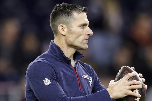 HOUSTON, TX - DECEMBER 01:  Director of player personnel Nick Caserio of the New England Patriots watches players warm up before the game against the Houston Texans at NRG Stadium on December 1, 2019 in Houston, Texas.  (Photo by Tim Warner/Getty Images)
