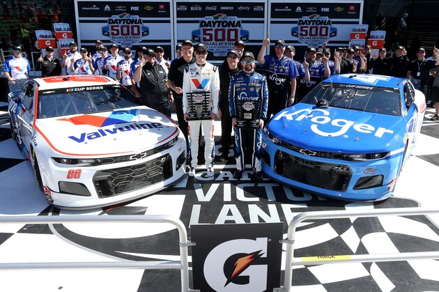 DAYTONA BEACH, FLORIDA - FEBRUARY 09: Ricky Stenhouse Jr., driver of the #47 Kroger Chevrolet, and Alex Bowman, driver of the #88 Valvoline Chevrolet, pose with the front row awards following qualifying for the NASCAR Cup Series 62nd Annual Daytona 500 at Daytona International Speedway on February 09, 2020 in Daytona Beach, Florida. Stenhouse Jr. posted the quickest lap during qualifying and will lead the field to the green flag. (Photo by Brian Lawdermilk/Getty Images)