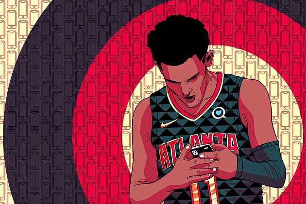 SALT LAKE CITY, UT - MARCH 06:  Rudy Robert #27 and Raul Neto #25 of the Utah Jazz look at their phones while on the team plane going to play the Memphis Grizzlies in New Orleans on March 06, 2019 in New Orleans, LA. NOTE TO USER: User expressly acknowledges and agrees that, by downloading and or using this Photograph, User is consenting to the terms and conditions of the Getty Images License Agreement. Mandatory Copyright Notice: Copyright 2019 NBAE (Photo by Melissa Majchrzak/NBAE via Getty Images)