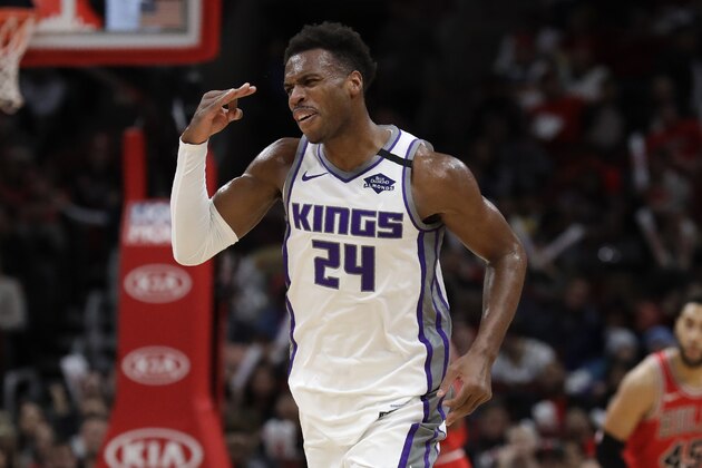 Sacramento Kings guard Buddy Hield reacts after making a three-point basket during the second half of an NBA basketball game against the Chicago Bulls in Chicago, Friday, Jan. 24, 2020. (AP Photo/Nam Y. Huh)