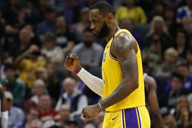 Los Angeles Lakers forward LeBron James pumps his fist the Lakers scored against the Sacramento Kings during the second half of an NBA basketball game in Sacramento, Calif., Saturday, Feb. 1, 2020. The Lakers won 129-113. (AP Photo/Rich Pedroncelli)
