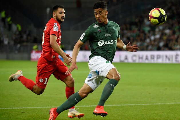 Montpellier's French forward Gaitan Laborde (L) vies with Saint-Etienne's French forward William Saliba (R) during the French L1 football match between Saint-Etienne (ASSE) and Montpellier (MHSC) on May 10, 2019, at the Geoffroy Guichard Stadium in Saint-Etienne, central France. (Photo by JEAN-PHILIPPE KSIAZEK / AFP)        (Photo credit should read JEAN-PHILIPPE KSIAZEK/AFP via Getty Images)