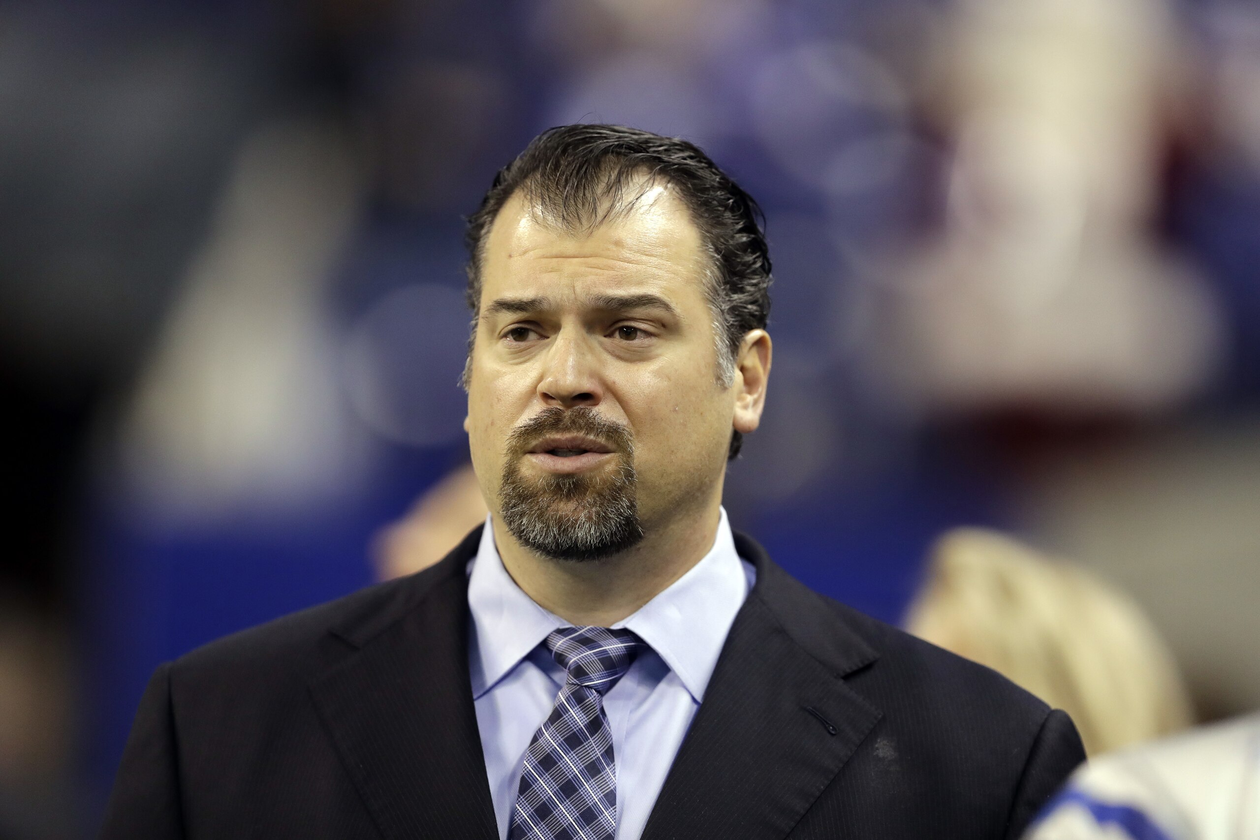 FILE- In this Dec. 11, 2016, file photo, Indianapolis Colts general manager Ryan Grigson watches before the start of an NFL football game between the Colts and the Houston Texans in Indianapolis. The Colts fired Grigson on Saturday, Jan. 21, 2017.  (AP Photo/Darron Cummings)