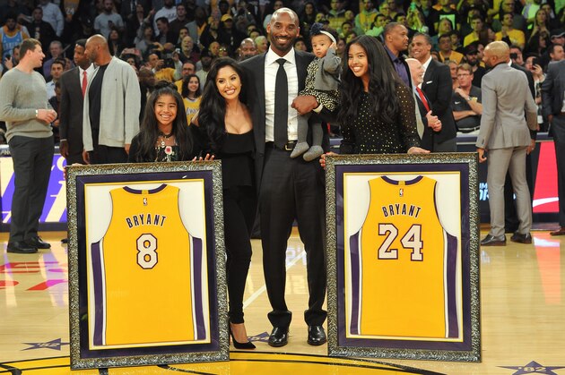 LOS ANGELES, CA - DECEMBER 18: Kobe Bryant, wife Vanessa Bryant and daughters Gianna Maria Onore Bryant, Natalia Diamante Bryant and Bianka Bella Bryant attend Kobe Bryant's jersey retirement ceremony during halftime of a basketball game between the Los Angeles Lakers and the Golden State Warriors at Staples Center on December 18, 2017 in Los Angeles, California.  (Photo by Allen Berezovsky/Getty Images)