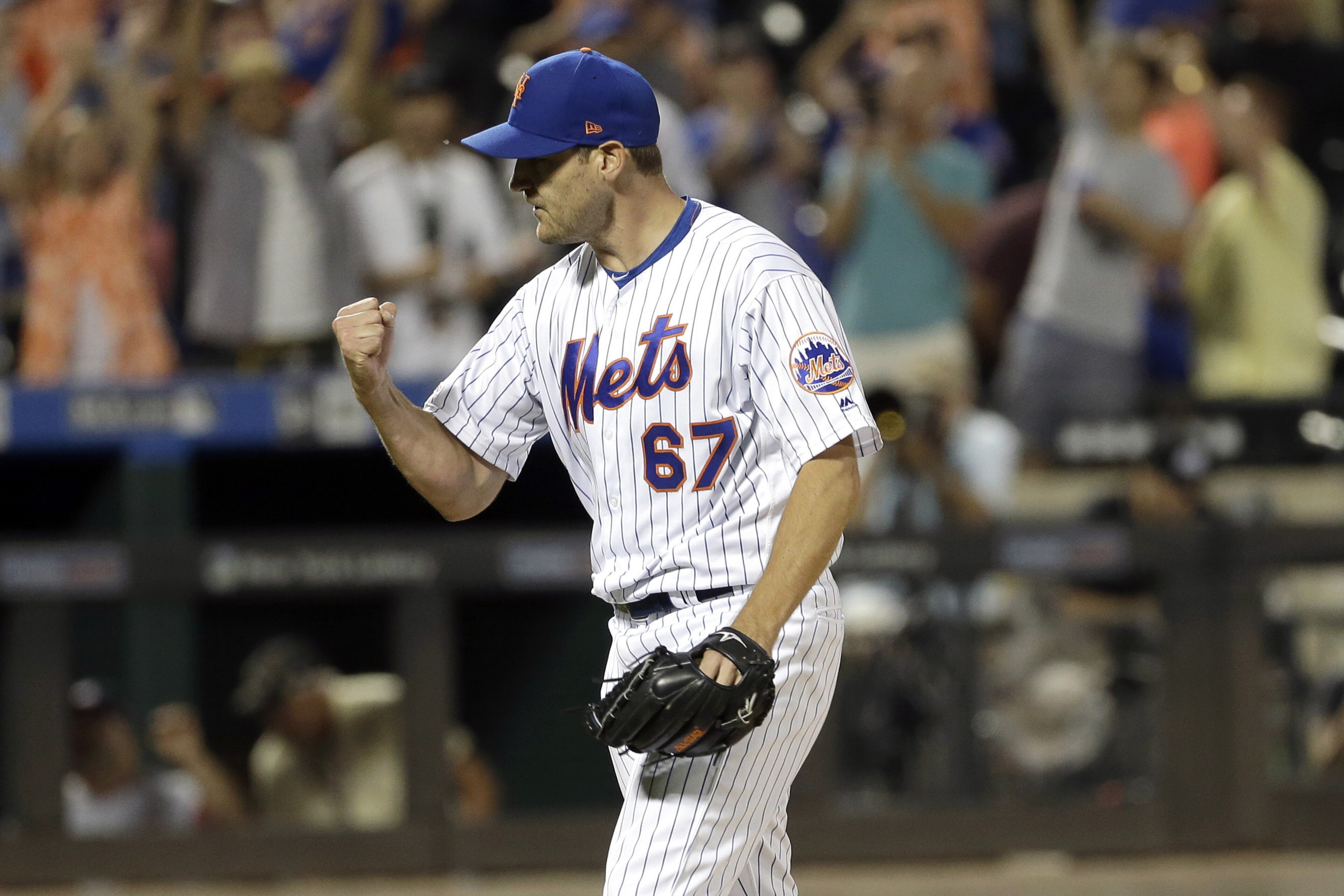 New York Mets relief pitcher Seth Lugo reacts after the last out of a baseball game against the Washington Nationals, Saturday, Aug. 10, 2019, in New York. (AP Photo/Seth Wenig)