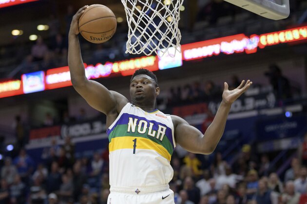 New Orleans Pelicans forward Zion Williamson grabs a rebound during the first half of the team's NBA basketball game against the Oklahoma City Thunder in New Orleans, Thursday, Feb. 13, 2020. (AP Photo/Matthew Hinton) New Orleans Pelicans forward Zion Williamson grabs a rebound during the first half of the team's NBA basketball game against the Oklahoma City Thunder in New Orleans, Thursday, Feb. 13, 2020. (AP Photo/Matthew Hinton)