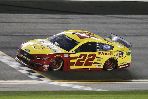 Joey Logano crosses the finish line to win the first of the two NASCAR Daytona 500 qualifying auto races at Daytona International Speedway, Thursday, Feb. 13, 2020, in Daytona Beach, Fla. (AP Photo/Terry Renna)