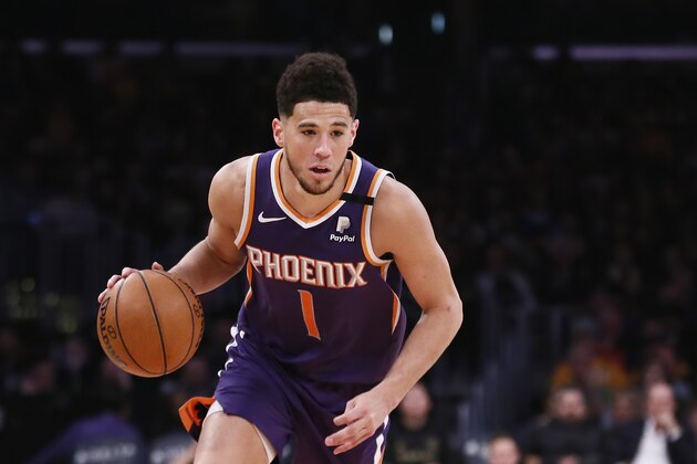 LOS ANGELES, CA - FEBRUARY 10: Devin Booker #1 of the Phoenix Suns drives to the basket against the Los Angeles Lakers at the Staples Center on February 10, 2020 in Los Angeles, CA. NOTE TO USER: User expressly acknowledges and agrees that, by downloading and or using this photograph, User is consenting to the terms and conditions of the Getty Images License Agreement. Mandatory Credit: 2020 NBAE (Photo by Chris Elise/NBAE via Getty Images) LOS ANGELES, CA - FEBRUARY 10: Devin Booker #1 of the Phoenix Suns drives to the basket against the Los Angeles Lakers at the Staples Center on February 10, 2020 in Los Angeles, CA. NOTE TO USER: User expressly acknowledges and agrees that, by downloading and or using this photograph, User is consenting to the terms and conditions of the Getty Images License Agreement. Mandatory Credit: 2020 NBAE (Photo by Chris Elise/NBAE via Getty Images)