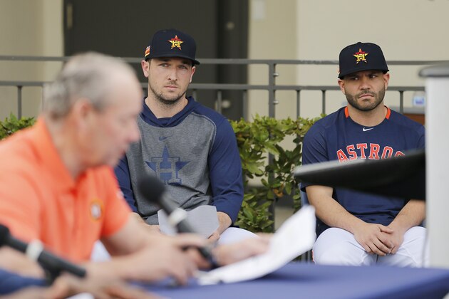 WEST PALM BEACH, FLORIDA - FEBRUARY 13:  Alex Bregman #2 and Jose Altuve #27 of the Houston Astros look on as owner Jim Crane reads a prepared statement during a press conference at FITTEAM Ballpark of The Palm Beaches on February 13, 2020 in West Palm Beach, Florida. (Photo by Michael Reaves/Getty Images)