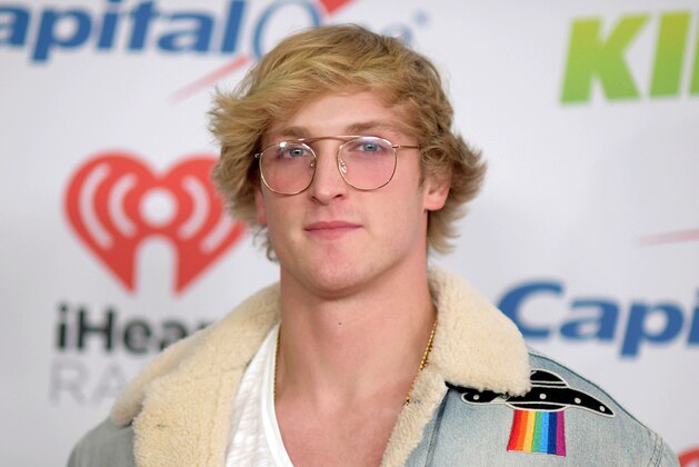 FILE - In this Dec. 1, 2017, file photo, YouTube personality Logan Paul arrives at Jingle Ball in Inglewood, Calif. Paul caused a social media furor in January after he posted video of himself in a forest near Mount Fuji in Japan near what appeared to be a body hanging from a tree. YouTube suspended the 22-year-old at the time for violating its policies. But Paul returned, and has posted a video of himself using a Taser on dead rats. That spurred YouTube to temporarily suspend all ads from Paul’s channel after what it called a pattern of behavior unsuitable for advertisers. (Photo by Richard Shotwell/Invision/AP, File)