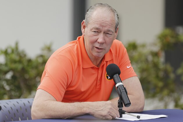 WEST PALM BEACH, FLORIDA - FEBRUARY 13:  Owner Jim Crane of the Houston Astros reads a prepared statement during a press conference at FITTEAM Ballpark of The Palm Beaches on February 13, 2020 in West Palm Beach, Florida. (Photo by Michael Reaves/Getty Images)