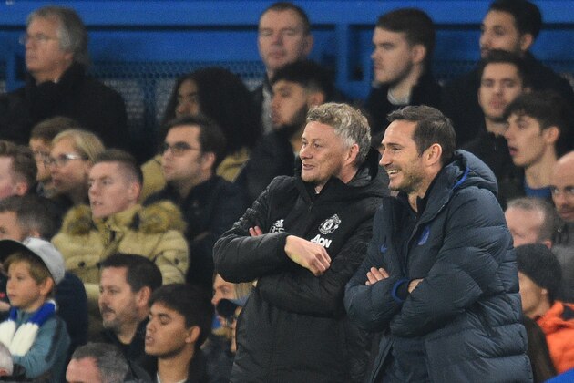 Manchester United's Norwegian manager Ole Gunnar Solskjaer (L) and Chelsea's English head coach Frank Lampard gesture during the English League Cup fourth round football match between Chelsea and Manchester United at Stamford Bridge in London on October 30, 2019. (Photo by Glyn KIRK / AFP) / RESTRICTED TO EDITORIAL USE. No use with unauthorized audio, video, data, fixture lists, club/league logos or 'live' services. Online in-match use limited to 75 images, no video emulation. No use in betting, games or single club/league/player publications. /  (Photo by GLYN KIRK/AFP via Getty Images)