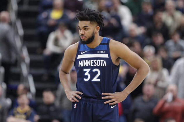 Minnesota Timberwolves center Karl-Anthony Towns (32) before the start of the first half of an NBA basketball game against the Indiana Pacers in Indianapolis, Friday, Jan. 17, 2020. (AP Photo/Michael Conroy)