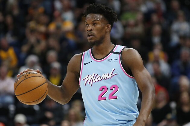 Miami Heat forward Jimmy Butler (22) brings the ball up court in the first half during an NBA basketball game against the Utah Jazz Wednesday, Feb. 12, 2020, in Salt Lake City. (AP Photo/Rick Bowmer)