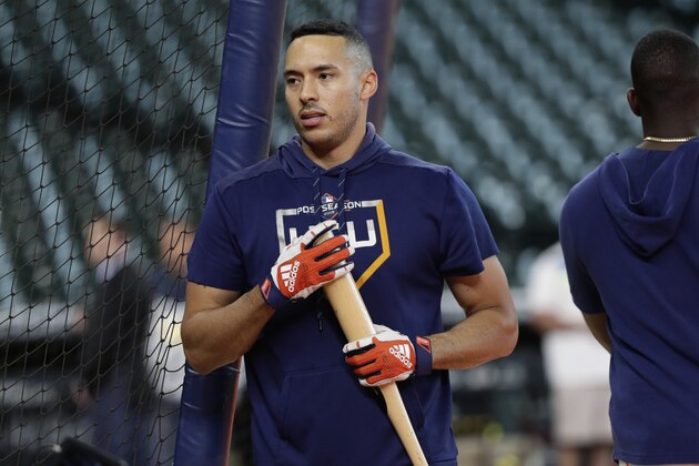 Houston Astros shortstop Carlos Correa takes batting practice during a workout for a baseball American League Championship Series in Houston, Friday, Oct. 11, 2019. Houston will face the New York Yankees Saturday. (AP Photo/Eric Gay)