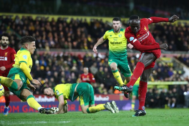 NORWICH, ENGLAND - FEBRUARY 15: Sadio Mane of Liverpool scores his team's first goal during the Premier League match between Norwich City and Liverpool FC at Carrow Road on February 15, 2020 in Norwich, United Kingdom. (Photo by Julian Finney/Getty Images)