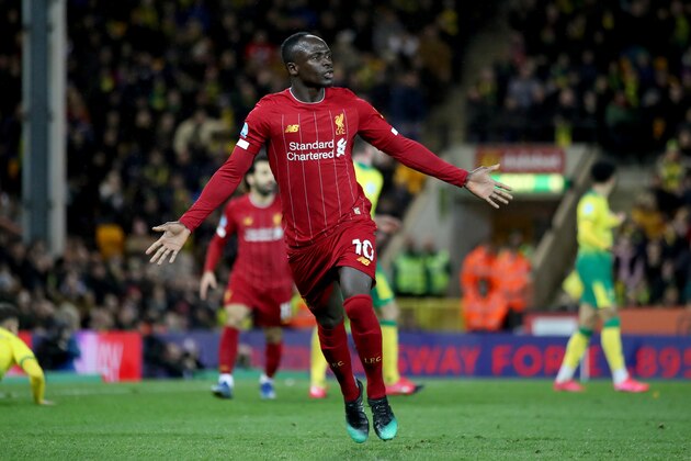 NORWICH, ENGLAND - FEBRUARY 15: Sadio Mane of Liverpool celebrates scoring the opening goal during the Premier League match between Norwich City and Liverpool FC at Carrow Road on February 15, 2020 in Norwich, United Kingdom. (Photo by Marc Atkins/Getty Images) NORWICH, ENGLAND - FEBRUARY 15: Sadio Mane of Liverpool celebrates scoring the opening goal during the Premier League match between Norwich City and Liverpool FC at Carrow Road on February 15, 2020 in Norwich, United Kingdom. (Photo by Marc Atkins/Getty Images)