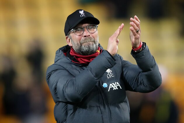 NORWICH, ENGLAND - FEBRUARY 15: Jurgen Klopp manager of Liverpool celebrates during the Premier League match between Norwich City and Liverpool FC at Carrow Road on February 15, 2020 in Norwich, United Kingdom. (Photo by Marc Atkins/Getty Images)
