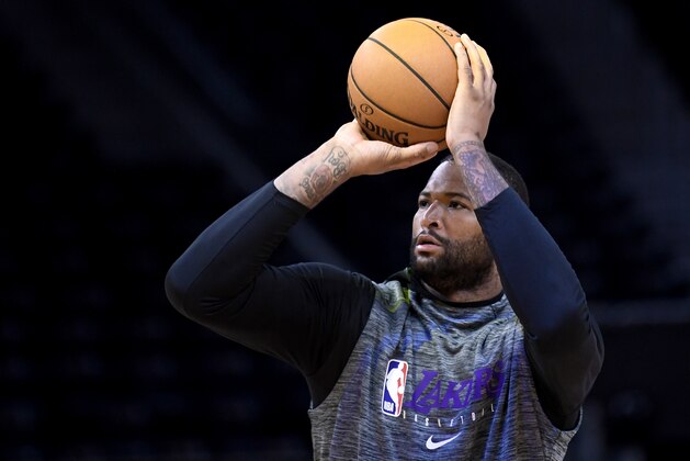 SAN FRANCISCO, CALIFORNIA - FEBRUARY 08: Injured Los Angeles Lakers DeMarcus Cousins #15 works out shooting prior to the start of an NBA basketball game against the Golden State Warriors at Chase Center on February 08, 2020 in San Francisco, California. NOTE TO USER: User expressly acknowledges and agrees that, by downloading and or using this photograph, User is consenting to the terms and conditions of the Getty Images License Agreement. (Photo by Thearon W. Henderson/Getty Images)