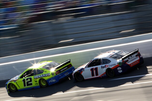 DAYTONA BEACH, FLORIDA - FEBRUARY 09: Ryan Blaney, driver of the #12 Menards/Peak Ford, leads Denny Hamlin, driver of the #11 FedEx Express Toyota, during the NASCAR Cup Series Busch Clash at Daytona International Speedway on February 09, 2020 in Daytona Beach, Florida. (Photo by Brian Lawdermilk/Getty Images) DAYTONA BEACH, FLORIDA - FEBRUARY 09: Ryan Blaney, driver of the #12 Menards/Peak Ford, leads Denny Hamlin, driver of the #11 FedEx Express Toyota, during the NASCAR Cup Series Busch Clash at Daytona International Speedway on February 09, 2020 in Daytona Beach, Florida. (Photo by Brian Lawdermilk/Getty Images)