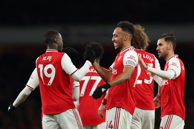 LONDON, ENGLAND - FEBRUARY 16: Pierre-Emerick Aubameyang of Arsenal celebrates after scoring a goal to make it 1-0 with Nicolas Pepe during the Premier League match between Arsenal FC and Newcastle United at Emirates Stadium on February 16, 2020 in London, United Kingdom. (Photo by James Williamson - AMA/Getty Images)