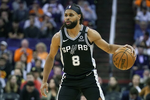 San Antonio Spurs guard Patty Mills (8) during the first half of an NBA basketball game against the Phoenix Suns Monday, Jan. 20, 2020, in Phoenix. (AP Photo/Rick Scuteri)